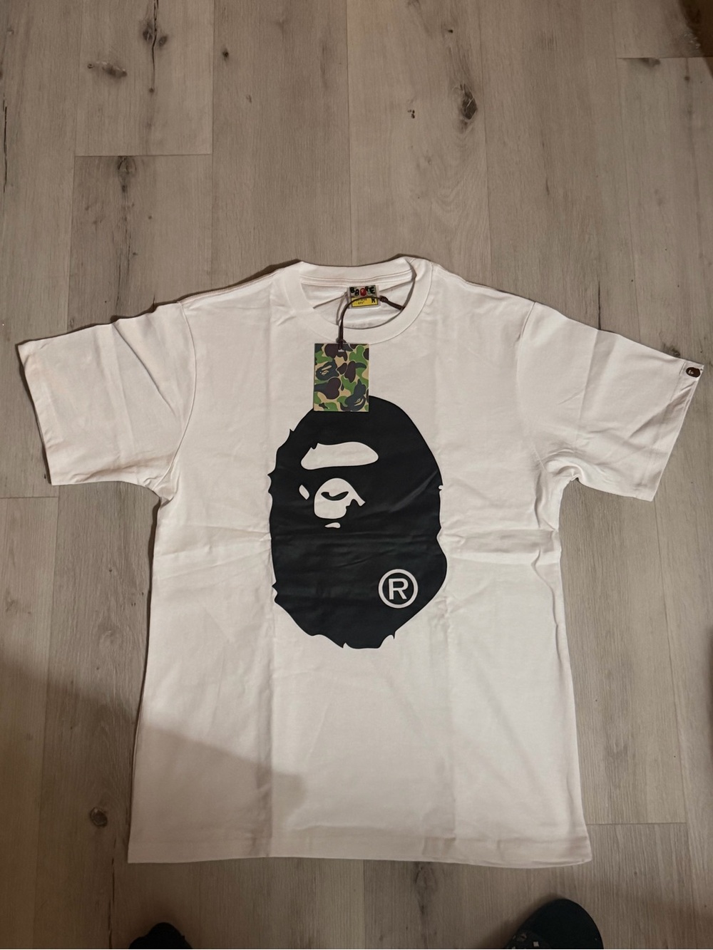 White Short-Sleeve Tee with Large Black Ape Head Graphic